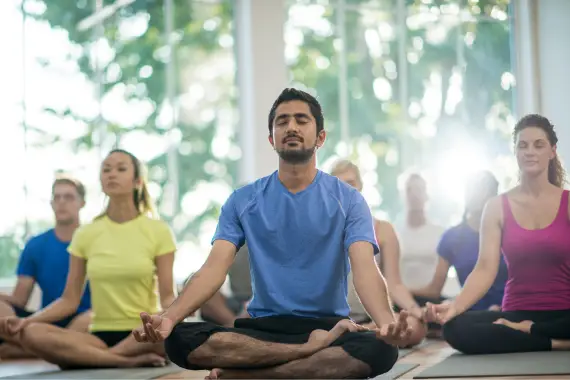 Group of People Practicing Meditation